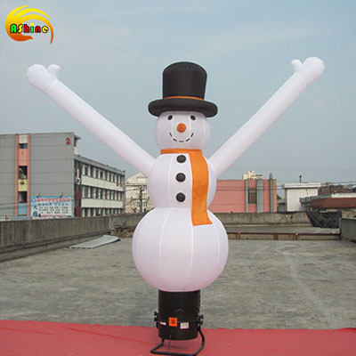 Cartoon snowman shaped inflatable dancers are applied in advertising campaigns Cartoon snowman shaped inflatable dancers are applied in advertising campaigns